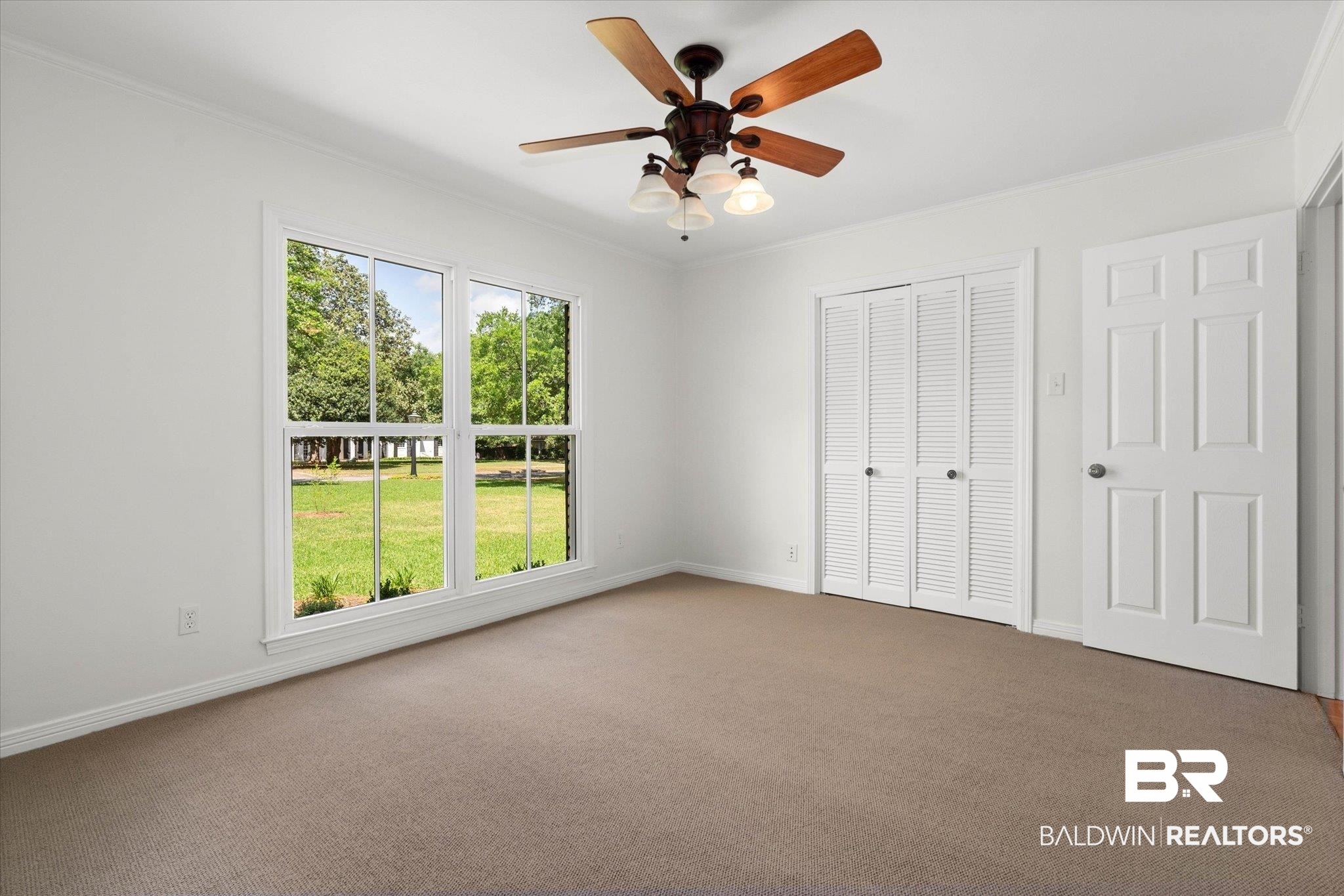 555 East Cumberland Road Mobile, AL 36608 - Photo 14 of 21 Unfurnished bedroom with carpet floors and ornamental molding