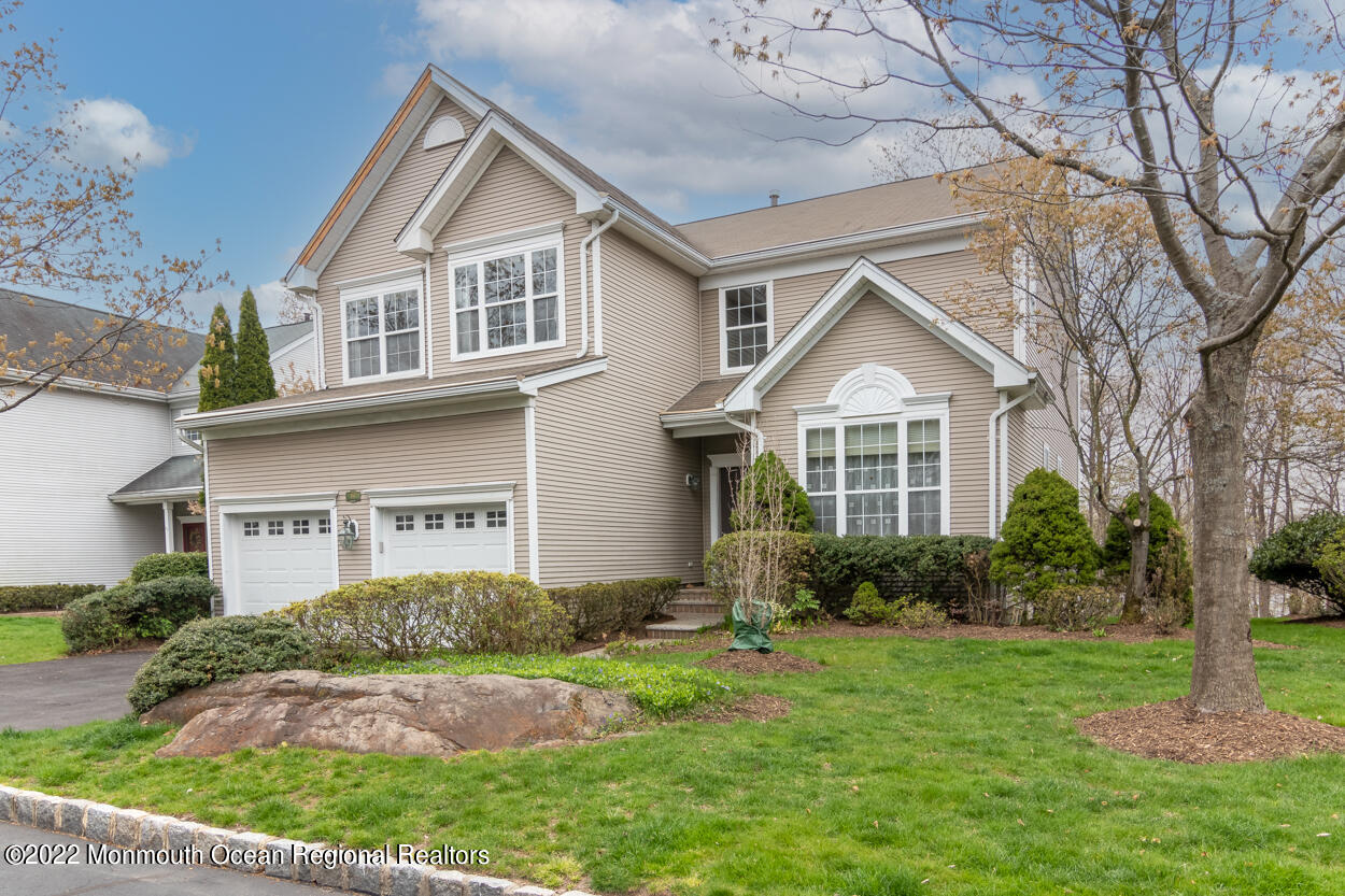 46 Glen Rock Road Cedar Grove, NJ 07009 - Photo 2 of 36 a front view of a house with garden