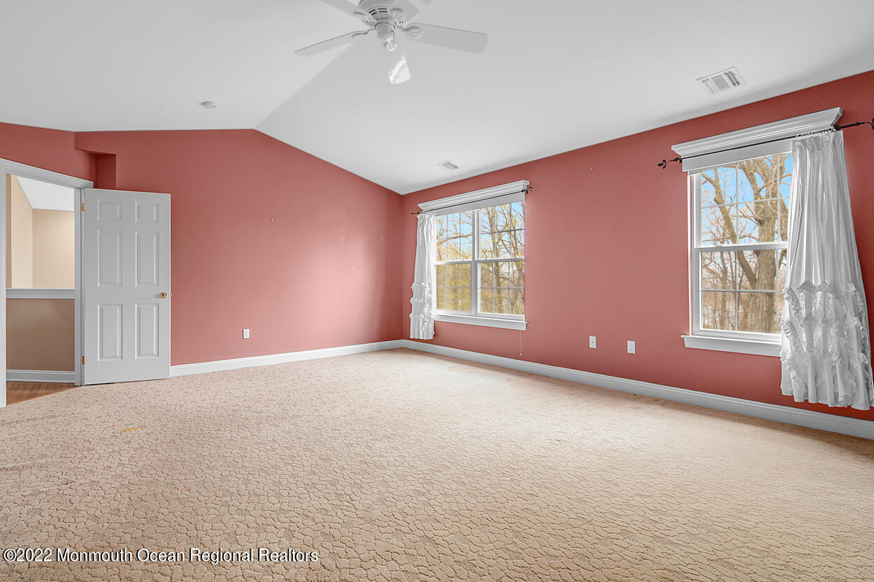 46 Glen Rock Road Cedar Grove, NJ 07009 - Photo 22 of 36 a view of an empty room with a window