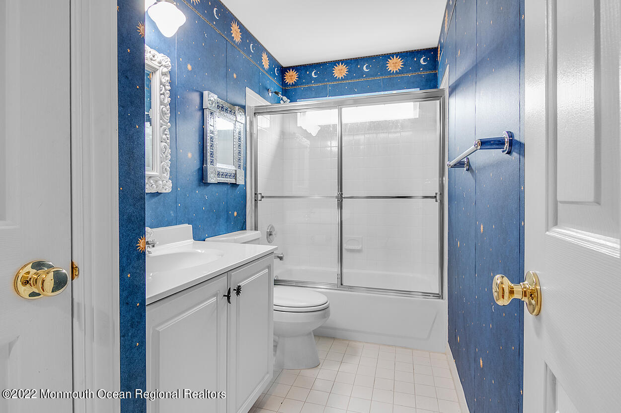46 Glen Rock Road Cedar Grove, NJ 07009 - Photo 27 of 36 a bathroom with a sink a toilet and shower