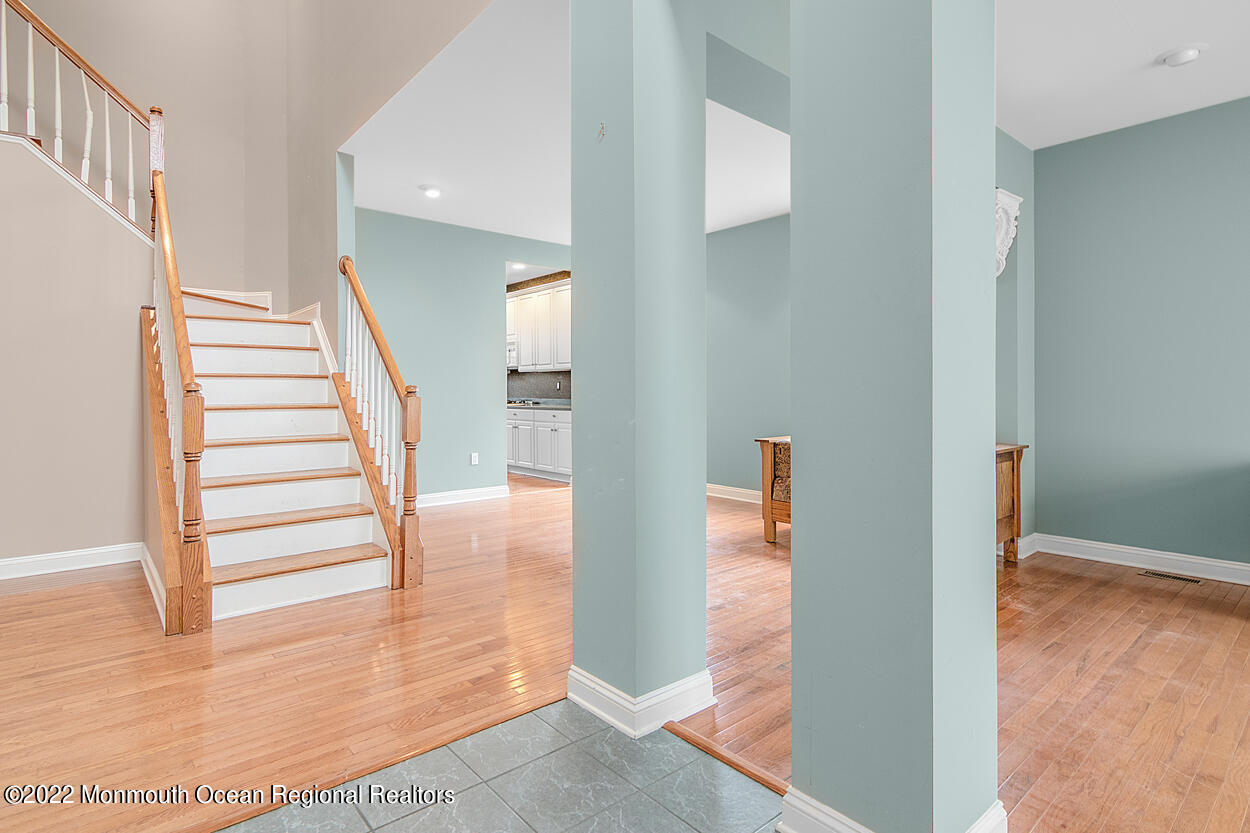 46 Glen Rock Road Cedar Grove, NJ 07009 - Photo 3 of 36 a view of a hallway with staircase