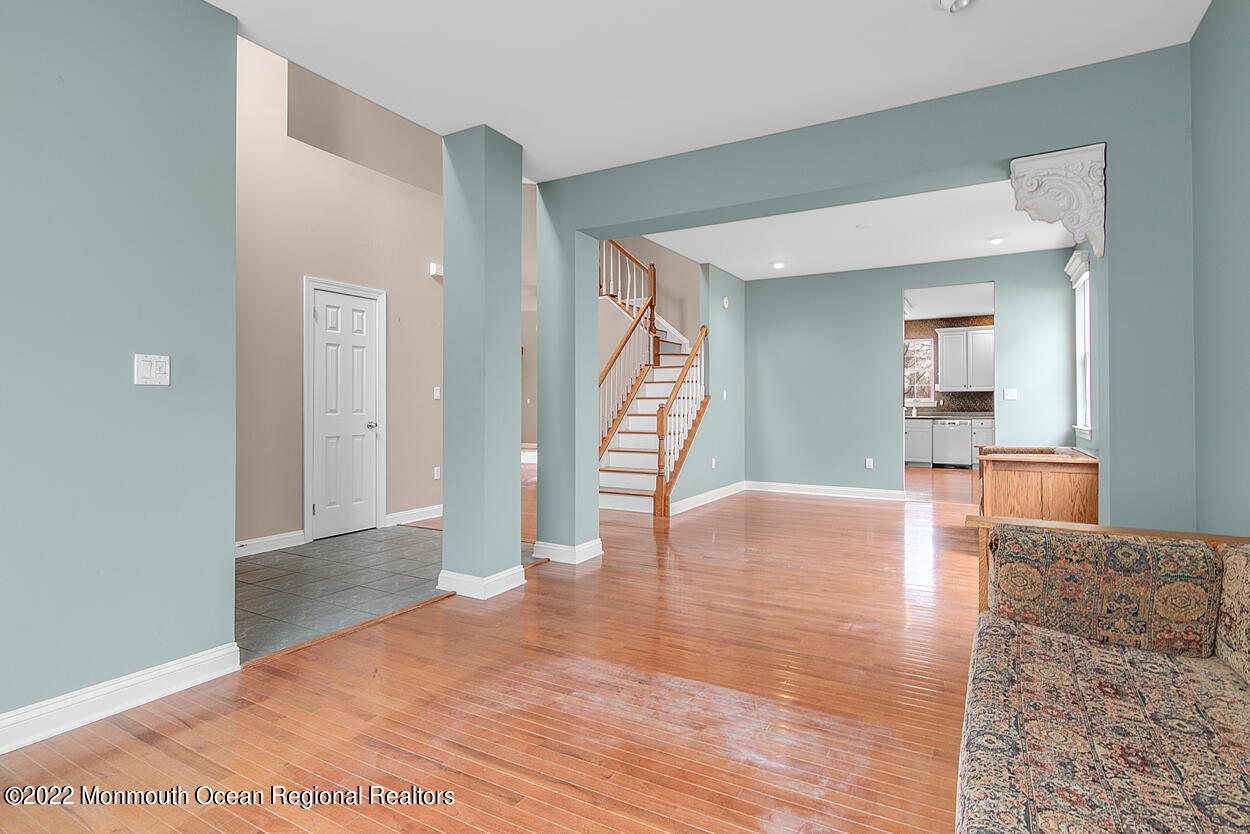 46 Glen Rock Road Cedar Grove, NJ 07009 - Photo 4 of 36 a view of empty room with wooden floor