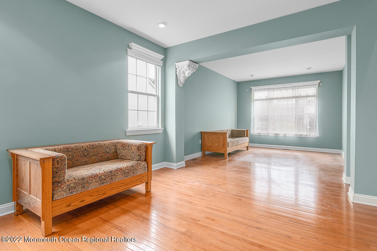 46 Glen Rock Road Cedar Grove, NJ 07009 - Photo 5 of 36 a living room with furniture and a window