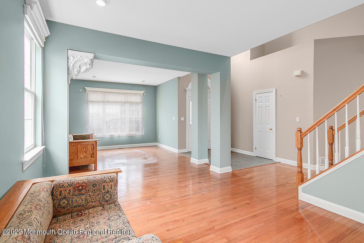 46 Glen Rock Road Cedar Grove, NJ 07009 - Photo 6 of 36 a view of livingroom with furniture and wooden floor