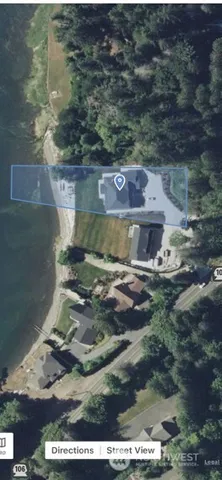 a view of swimming pool with a yard