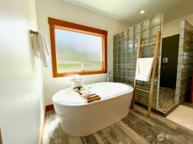 a bathroom with a sink and a large mirror