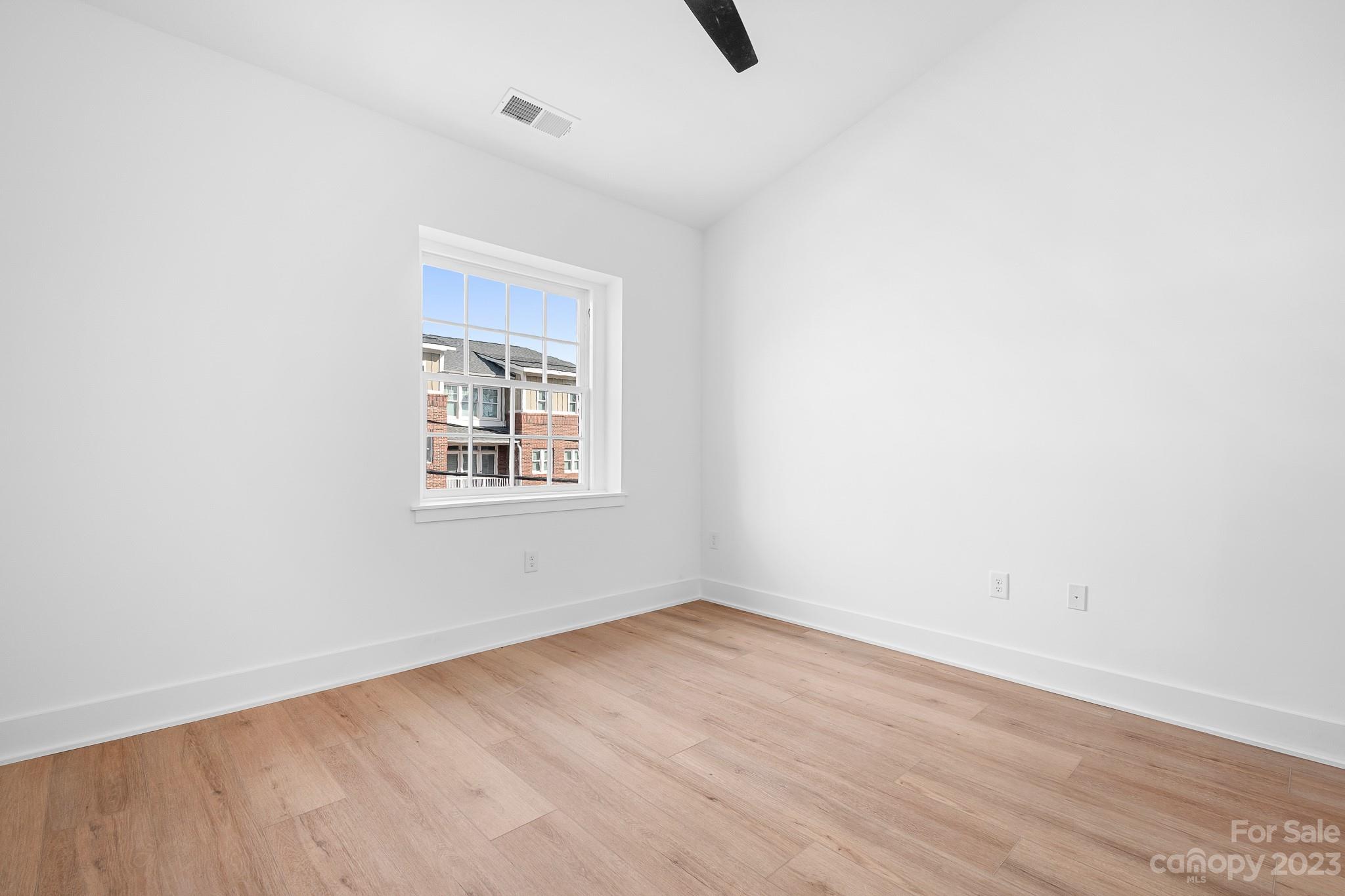 201 Grandin Road, Unit 14 Charlotte, NC 28208 - Photo 13 of 15 an empty room with a window