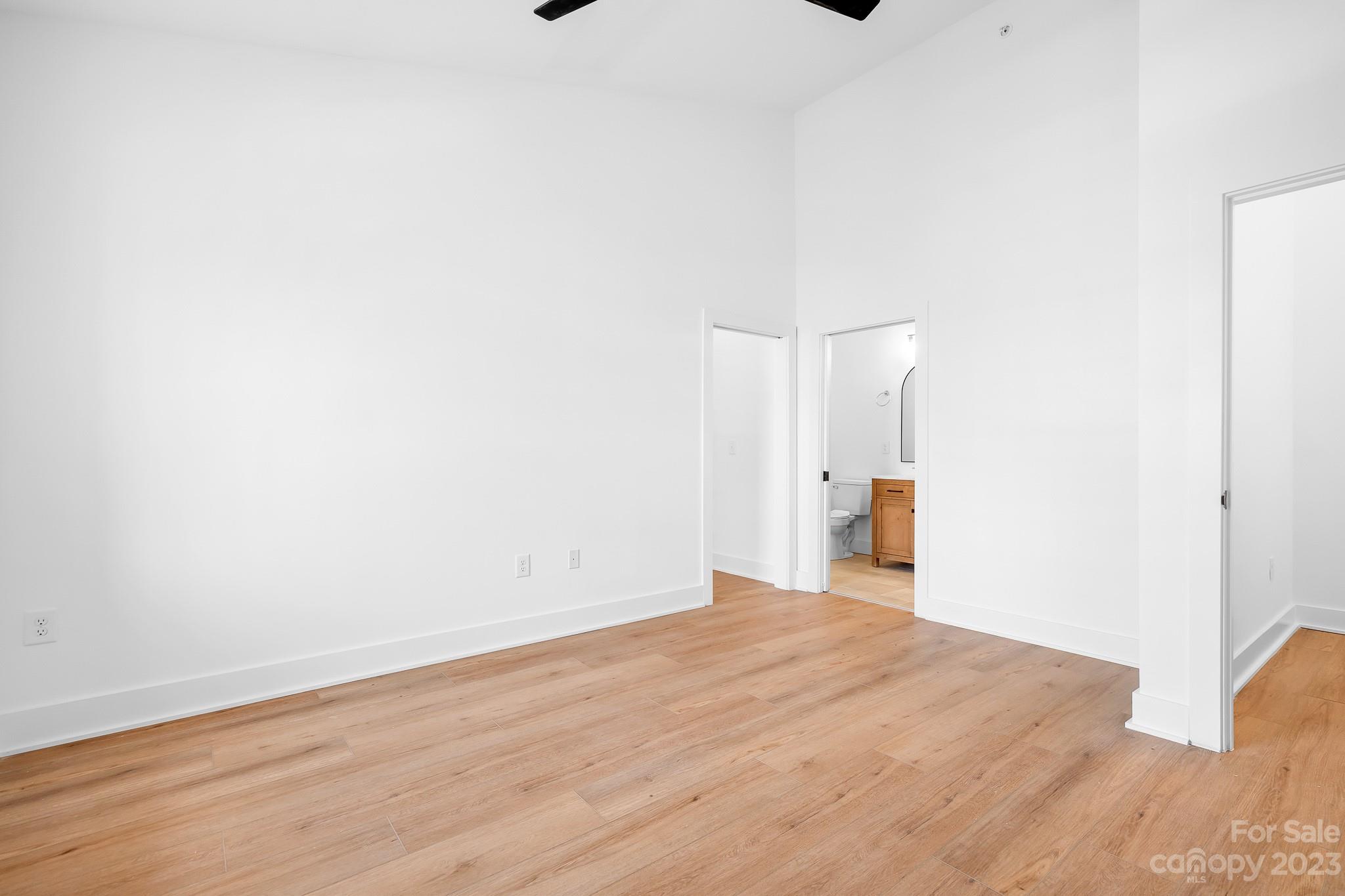 201 Grandin Road, Unit 14 Charlotte, NC 28208 - Photo 5 of 15 a view of a room with wooden floor