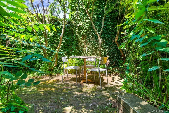 a view of a table and chairs in patio