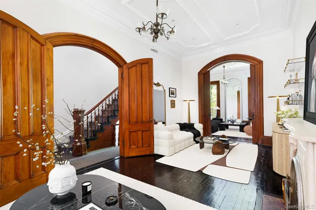 a spacious bedroom with a large bed and a window