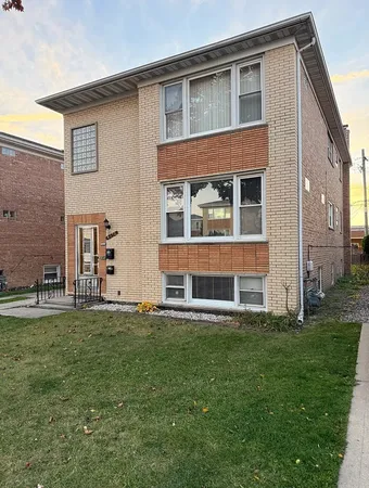 a big house with a big yard and more windows
