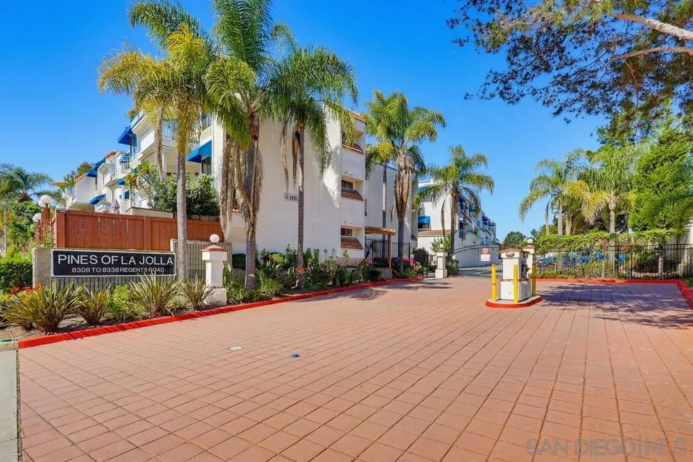 8324 Regents Road, Unit 2E San Diego, CA 92122 - Photo 2 of 31 front view of a house with palm trees