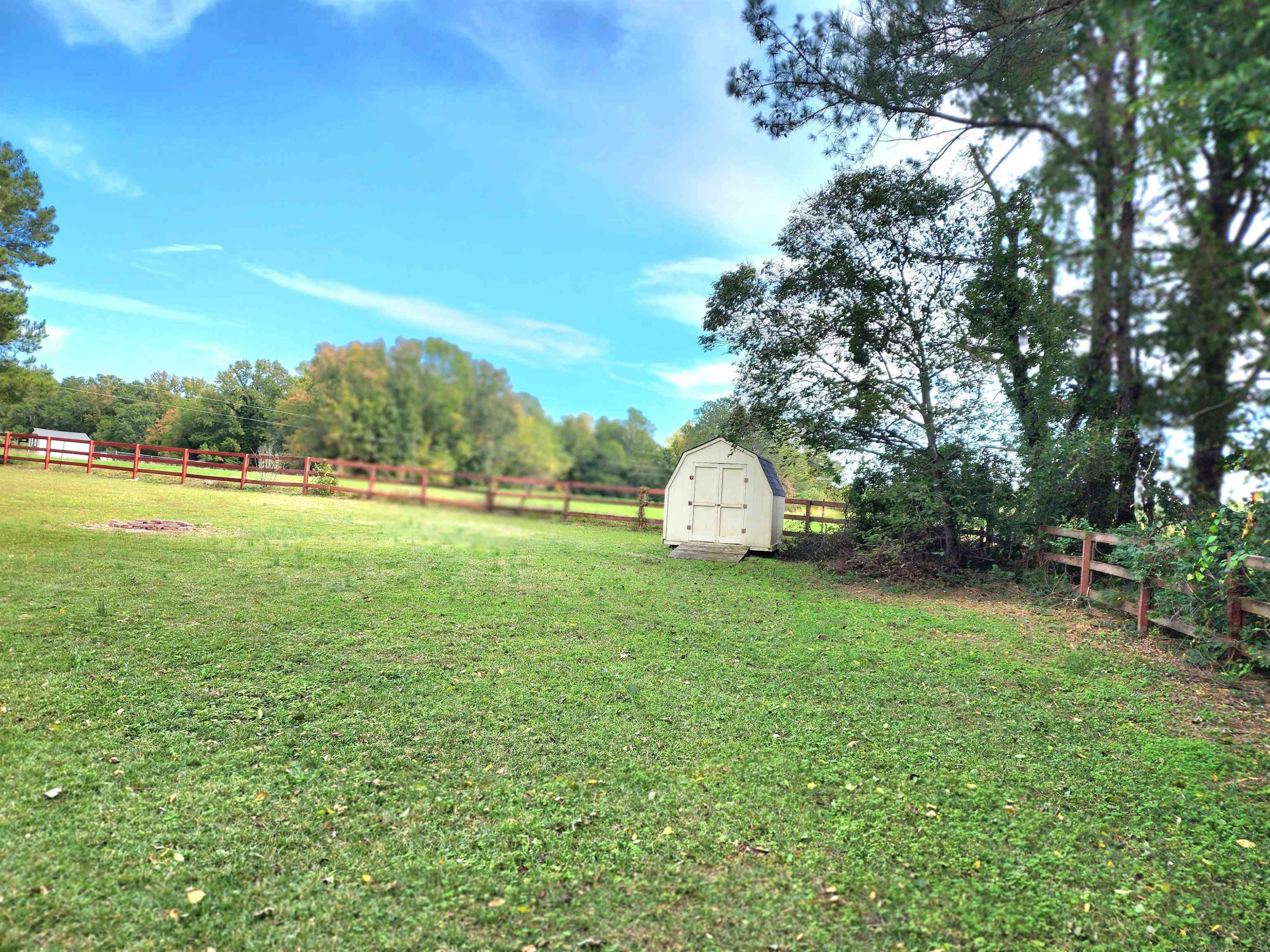 8333 Creek Road Willow Spring, NC 27592 - Photo 41 of 58 a view of a garden and basketball court