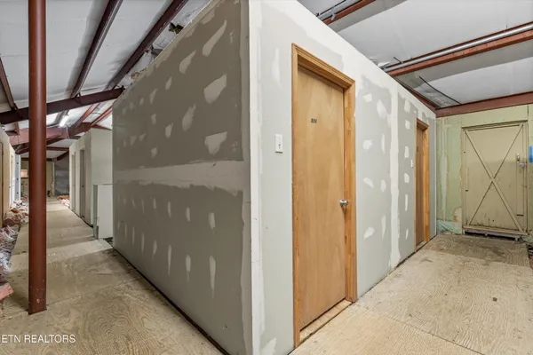 an aerial view of a house with a mountain view