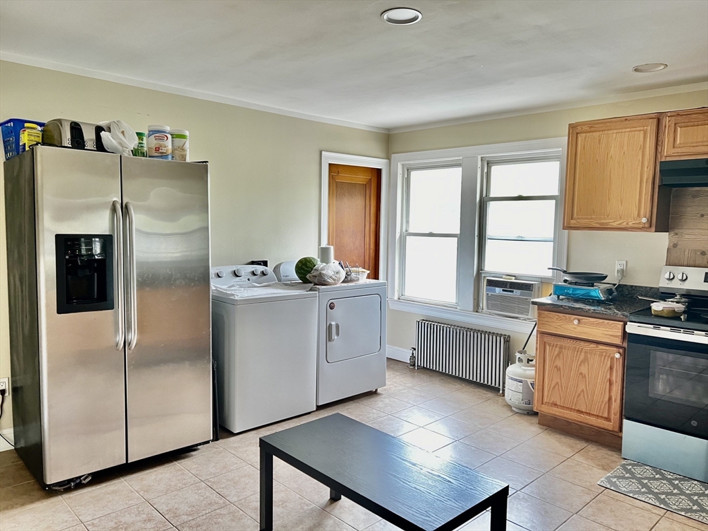 29 Brookfield Road, Unit 1 Sturbridge, MA 01518 - Photo 3 of 9 a kitchen with stainless steel appliances a refrigerator sink and cabinets