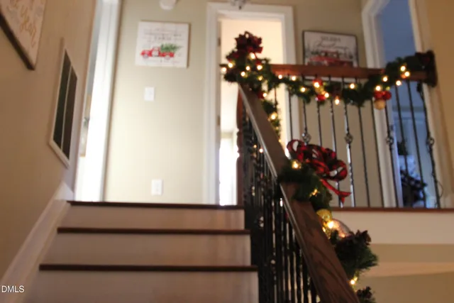 a table room with furniture and flowers