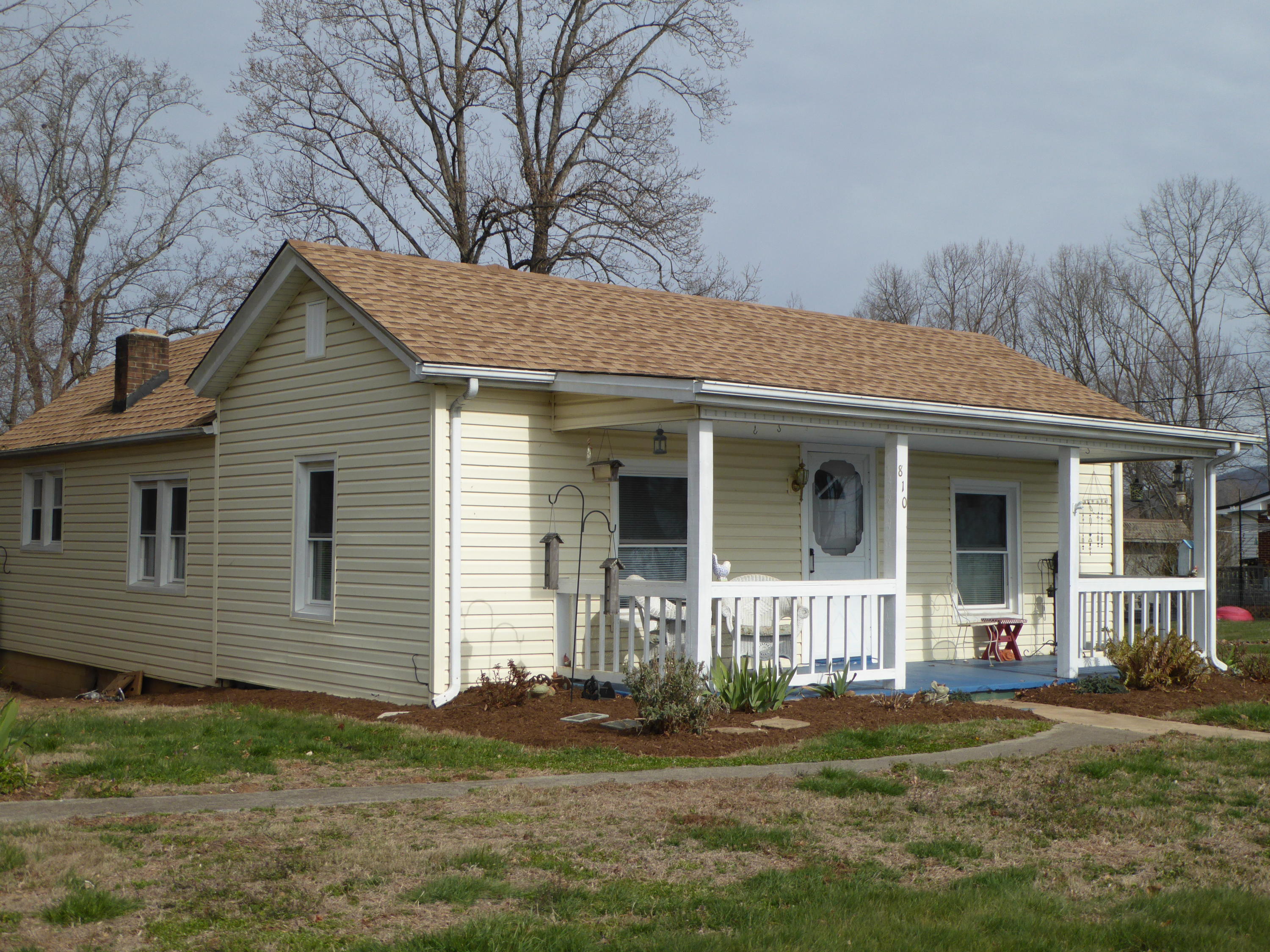 810 Scuffling Hill Road Rocky Mount, VA 24151 - Photo 2 of 52 a front view of a house with a garden