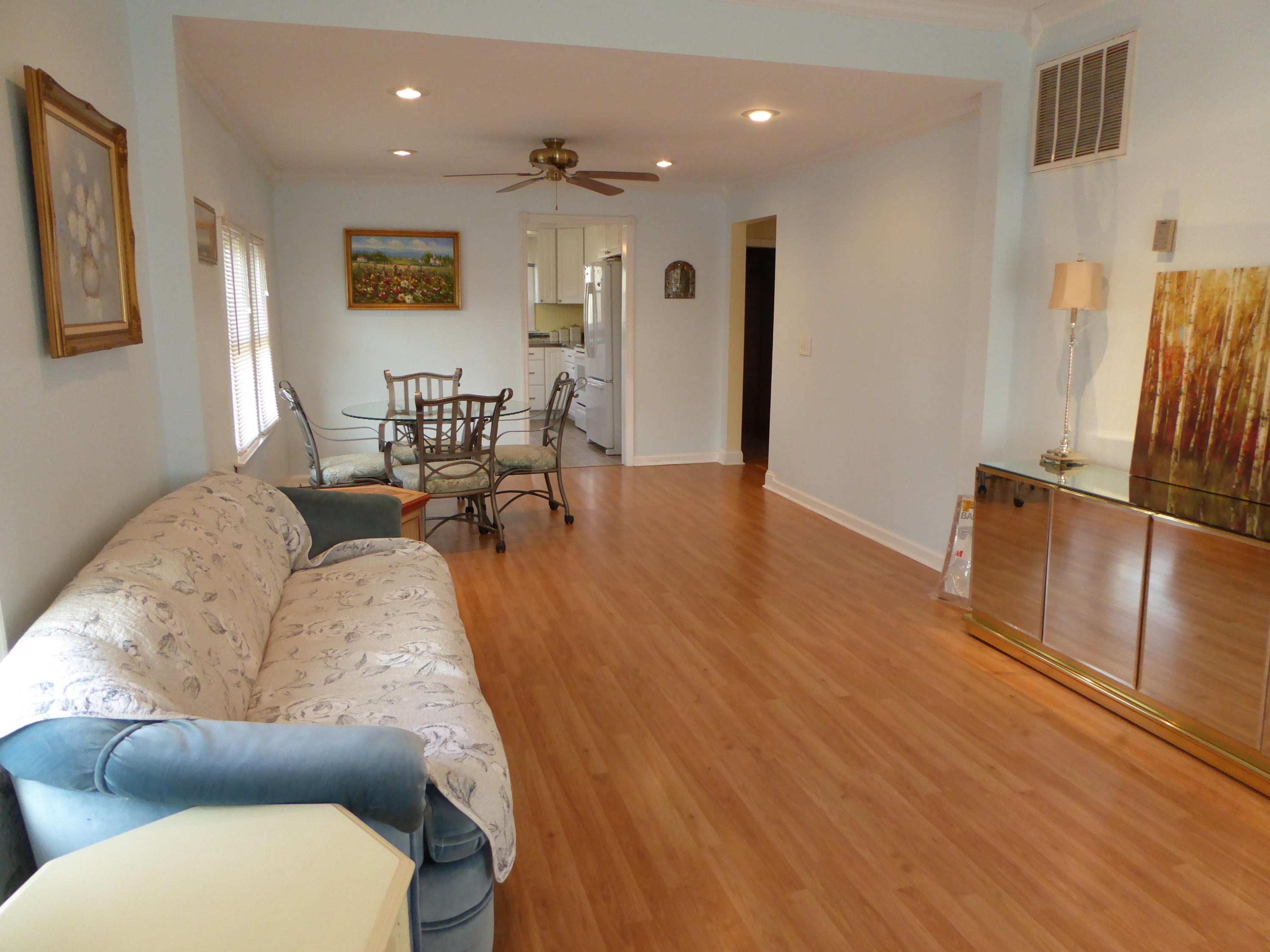 810 Scuffling Hill Road Rocky Mount, VA 24151 - Photo 31 of 52 a living room with furniture dining table and wooden floor