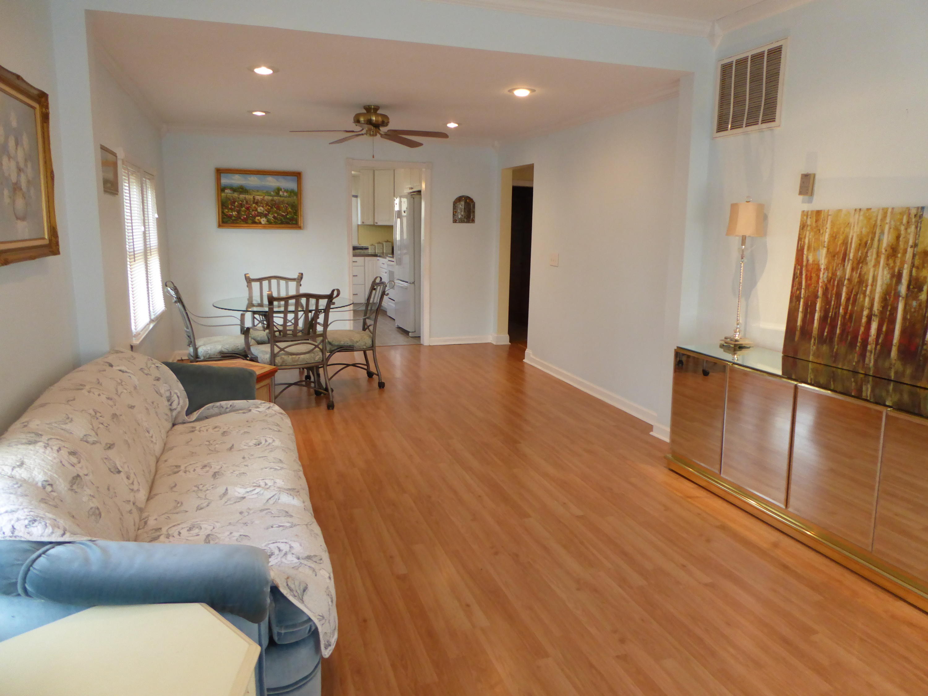 810 Scuffling Hill Road Rocky Mount, VA 24151 - Photo 33 of 52 a living room with furniture and a wooden floor