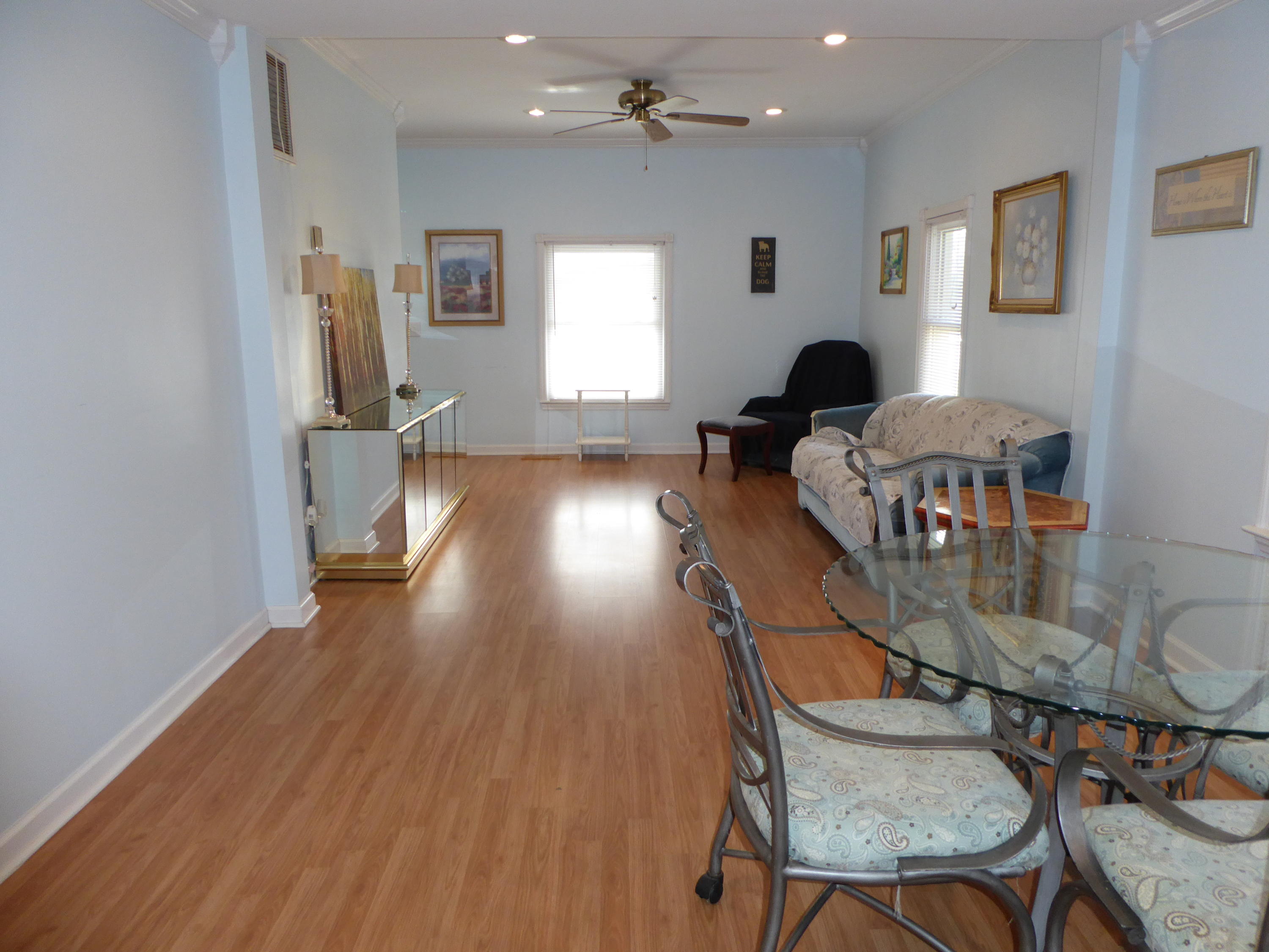 810 Scuffling Hill Road Rocky Mount, VA 24151 - Photo 34 of 52 a living room with furniture and a wooden floor