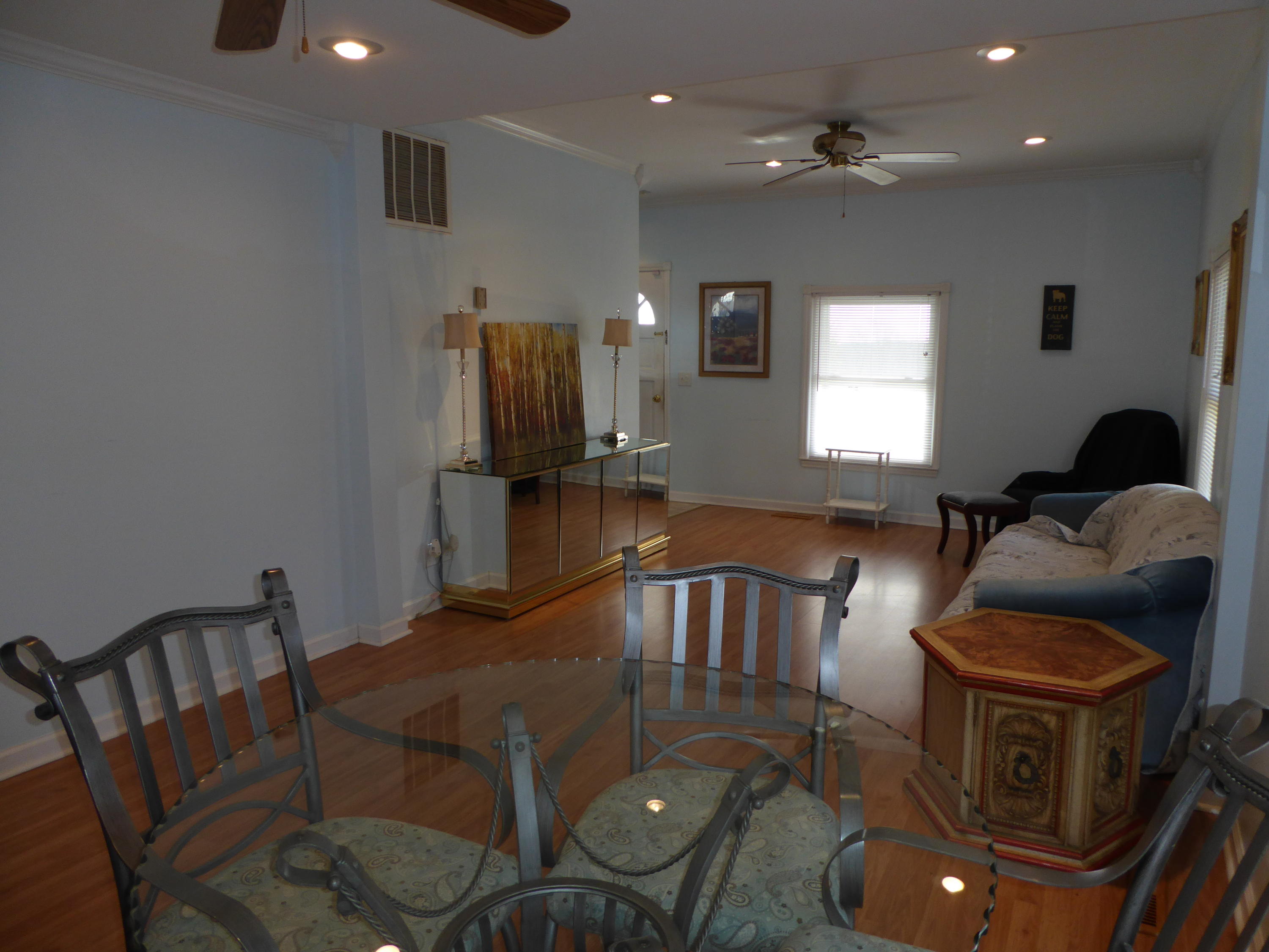 810 Scuffling Hill Road Rocky Mount, VA 24151 - Photo 35 of 52 a living room with furniture and a flat screen tv