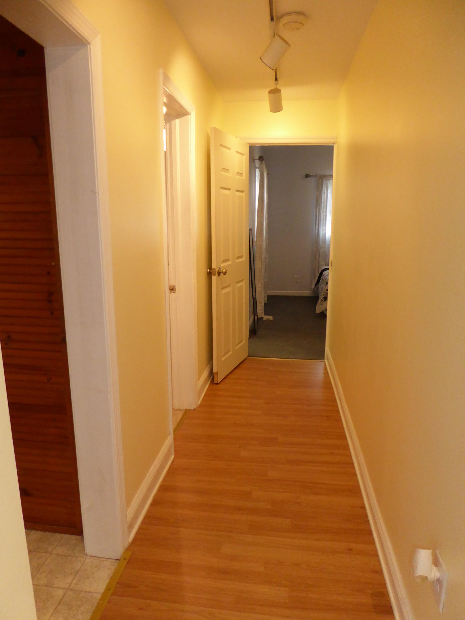810 Scuffling Hill Road Rocky Mount, VA 24151 - Photo 39 of 52 a view of a hallway with wooden floor