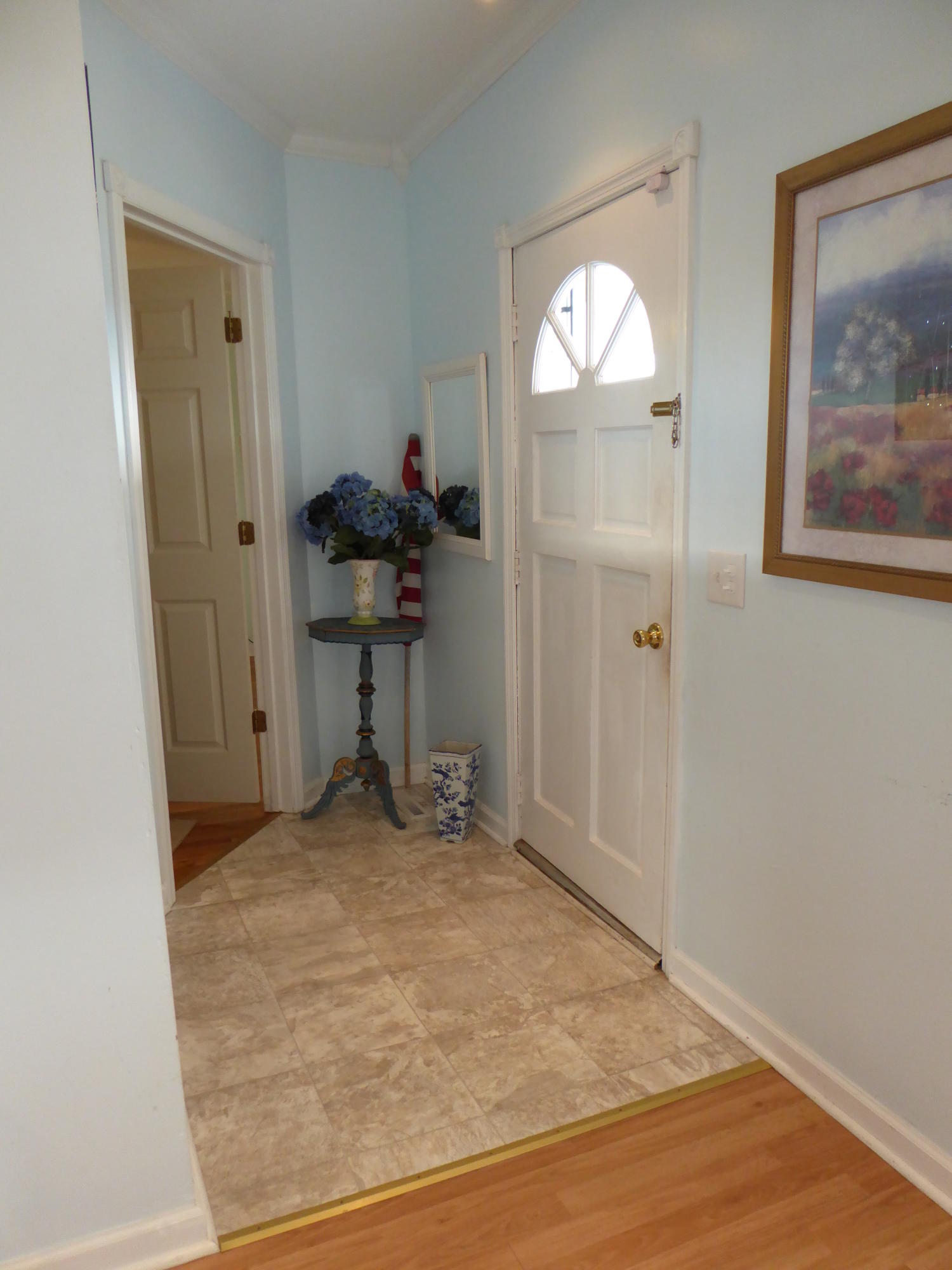 810 Scuffling Hill Road Rocky Mount, VA 24151 - Photo 5 of 52 a view of empty room with wooden floor and fan