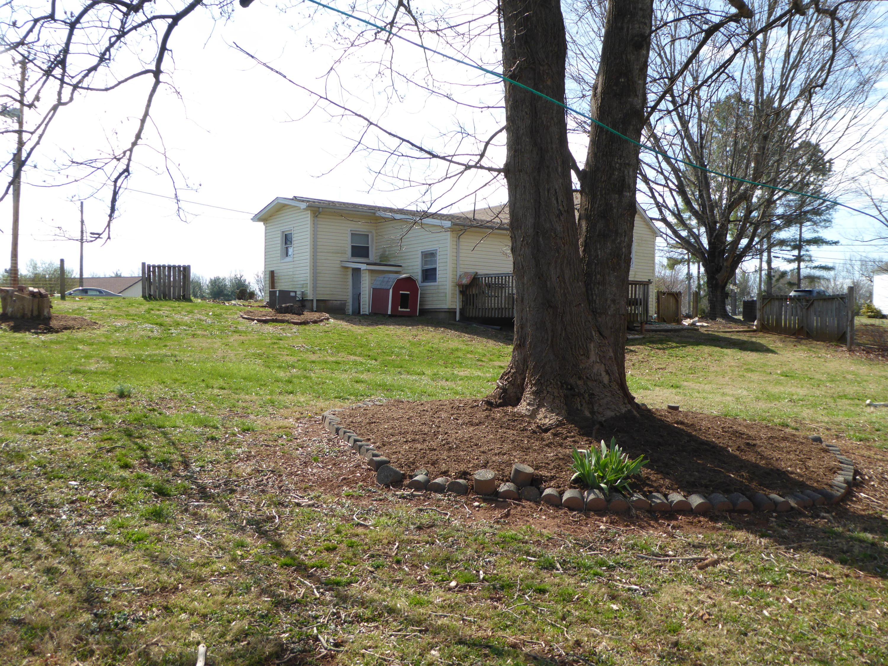 810 Scuffling Hill Road Rocky Mount, VA 24151 - Photo 51 of 52 a view of a house with backyard and trees