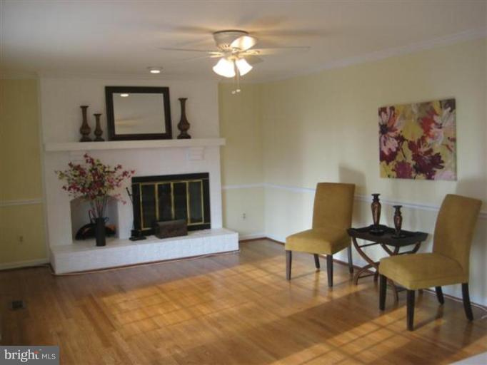 11598 Lake Newport Road Reston, VA 20194 - Photo 14 of 29 a living room with furniture and a fireplace