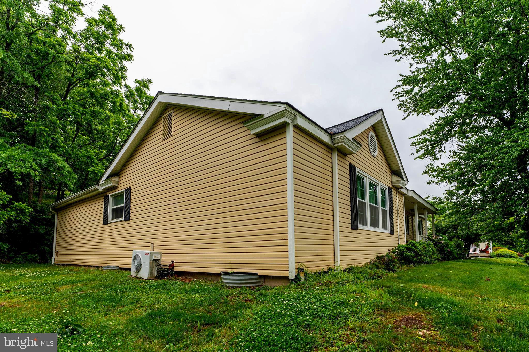 2941 Pheasant Run Road Norristown, PA 19403 - Photo 5 of 23 a front view of a house with garden