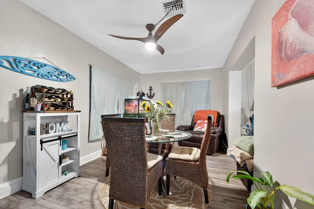 a work room with furniture and a bookshelf