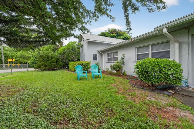 a house view with a garden space
