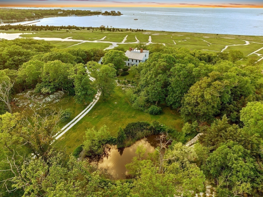 24 Wood Island Road Scituate, MA 02066 - Photo 18 of 42 a view of an ocean and a mountain