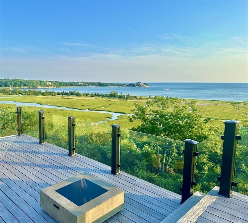 24 Wood Island Road Scituate, MA 02066 - Photo 29 of 42 a view of an ocean from a balcony