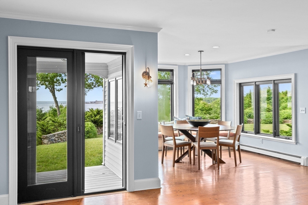 24 Wood Island Road Scituate, MA 02066 - Photo 32 of 42 a dining room with furniture window and wooden floor
