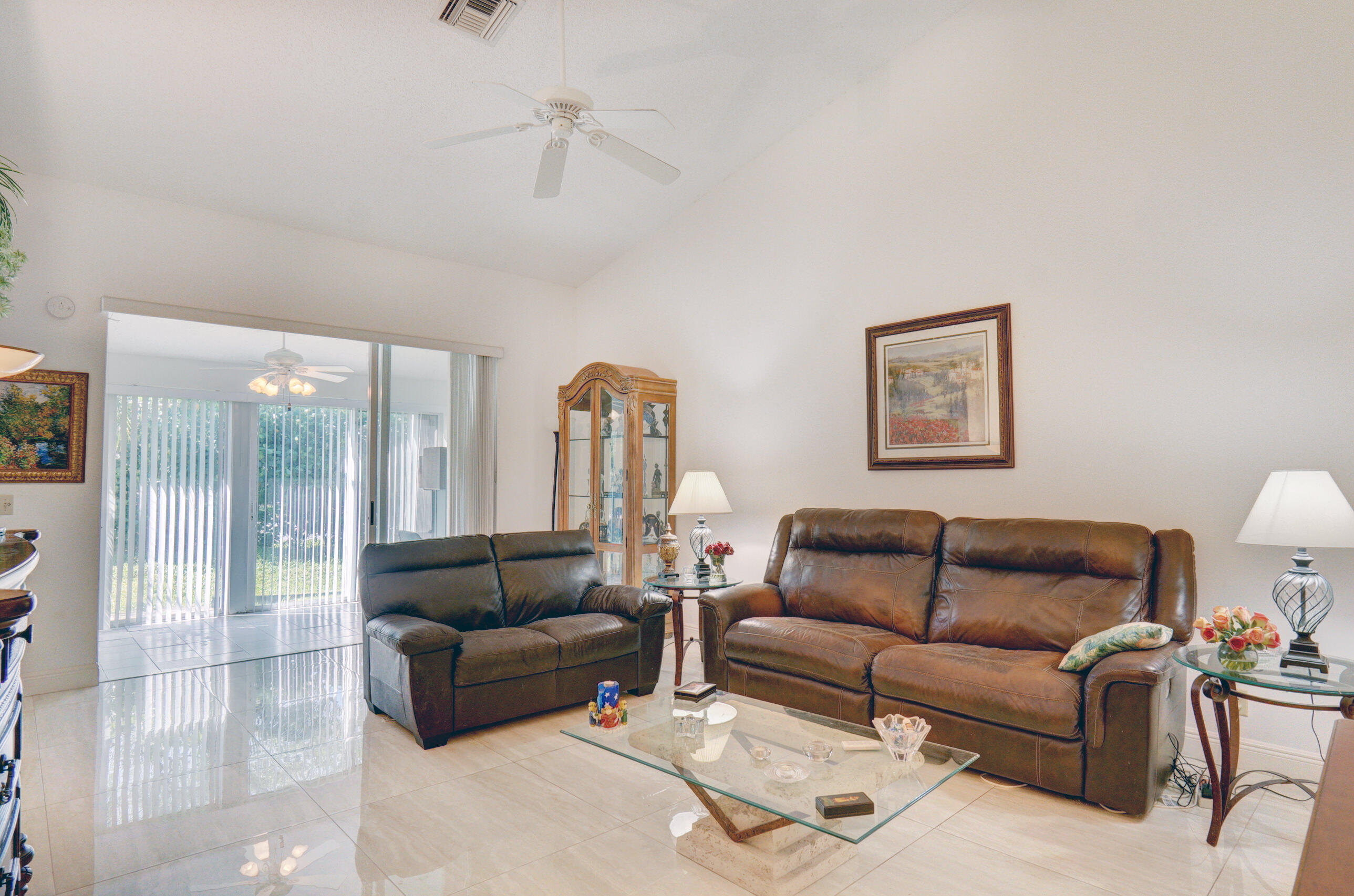 11110 Autoro Court Boca Raton, FL 33498 - Photo 8 of 24 a living room with furniture and a large window