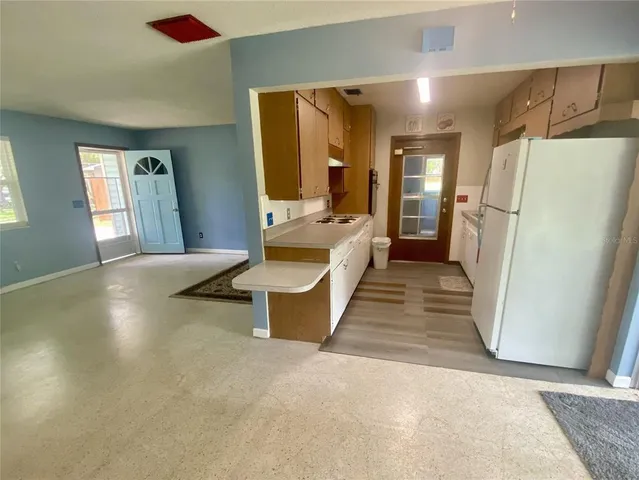 a living room with a couch and a table