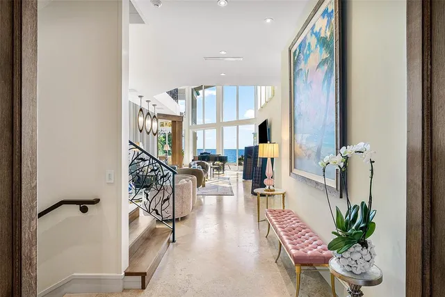 a bathroom with a sink mirror and vanity
