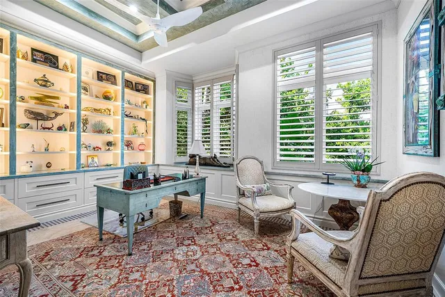 a bathroom with a tub sink shower and mirror