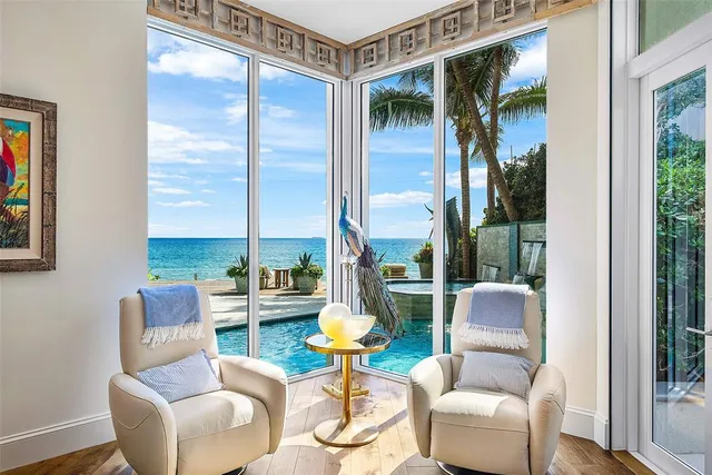 a kitchen with granite countertop a sink a counter space appliances and cabinets