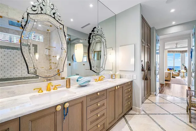 a kitchen with stainless steel appliances granite countertop a stove oven and a sink