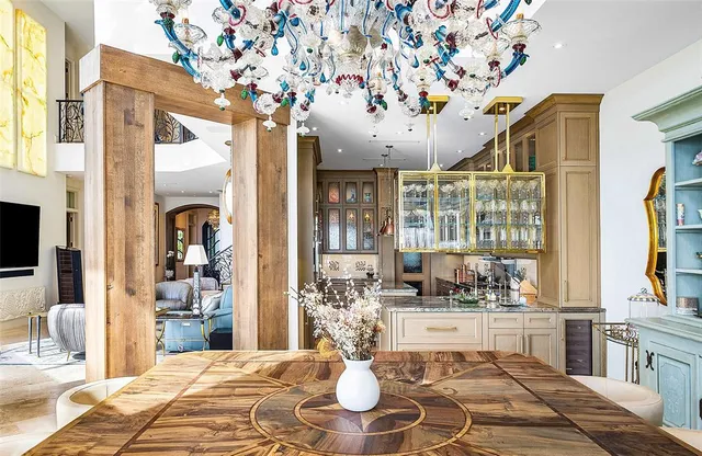 a bathroom with a tub shower and mirror