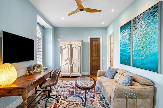 a front view of a house with a yard table and chairs