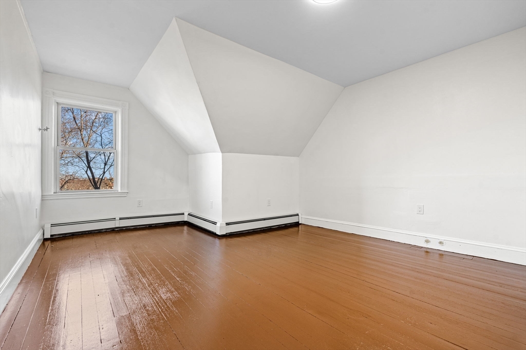 36 Elm Hill Park, Unit 1F Boston, MA 02121 - Photo 20 of 23 a view of an empty room with a window
