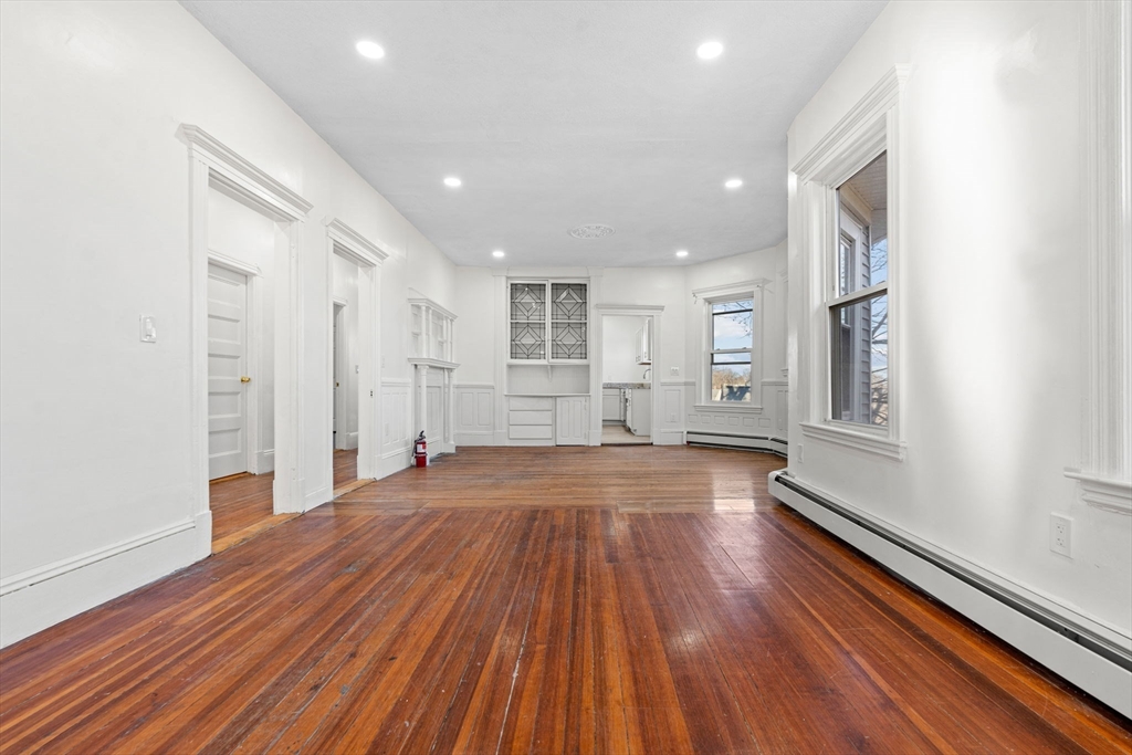 36 Elm Hill Park, Unit 1F Boston, MA 02121 - Photo 8 of 23 a view of empty room with wooden floor