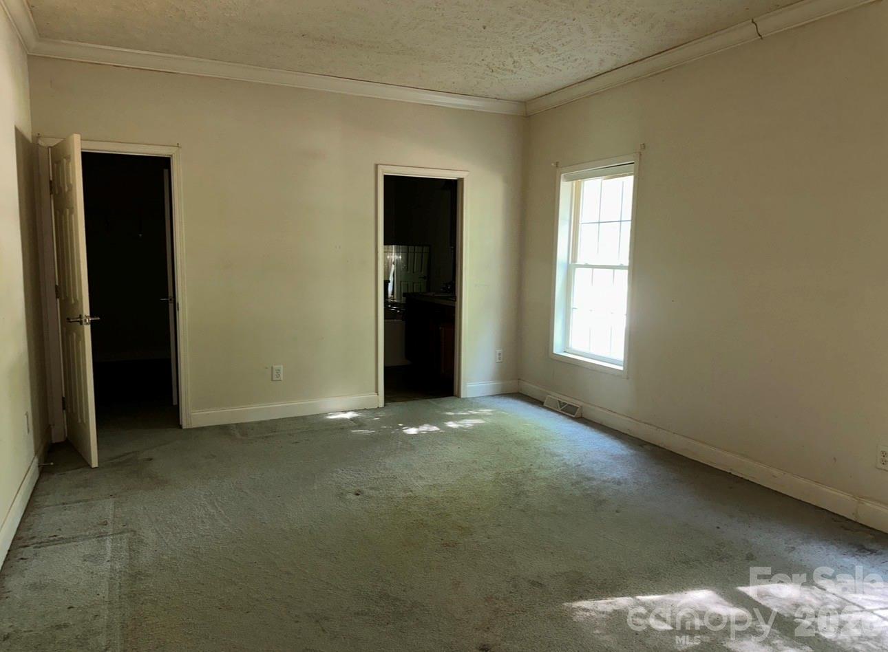 172 Jesse King Road Advance, NC 27006 - Photo 13 of 23 a view of an empty room with window