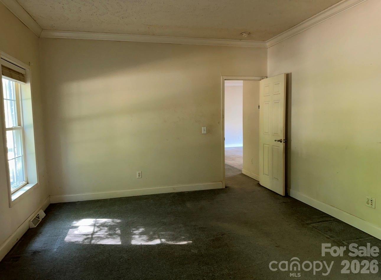172 Jesse King Road Advance, NC 27006 - Photo 14 of 23 a view of an empty room and window