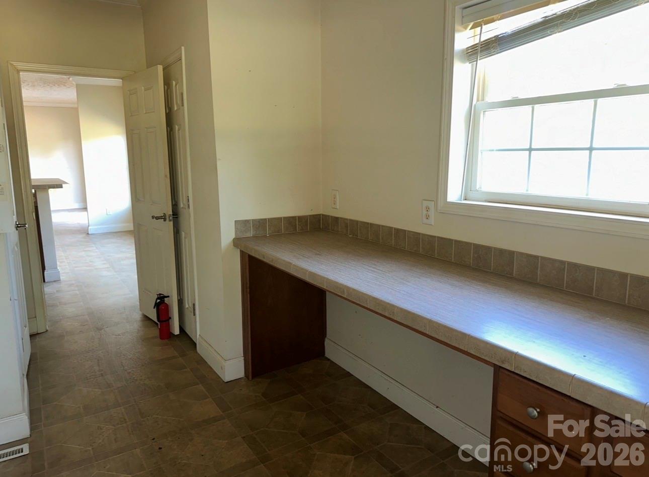 172 Jesse King Road Advance, NC 27006 - Photo 20 of 23 a kitchen with a sink and a window