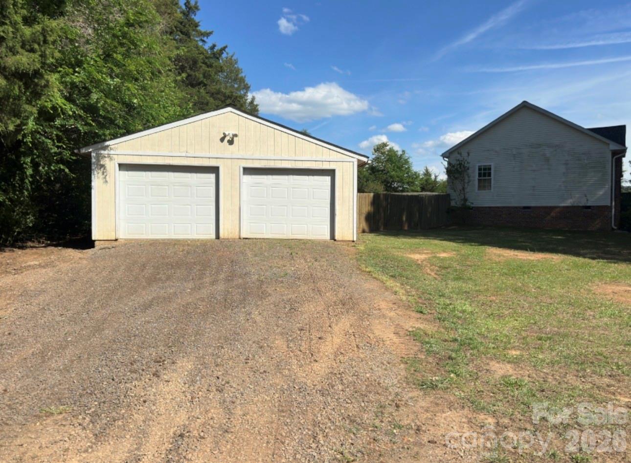 172 Jesse King Road Advance, NC 27006 - Photo 4 of 23 a front view of a house with yard and garage