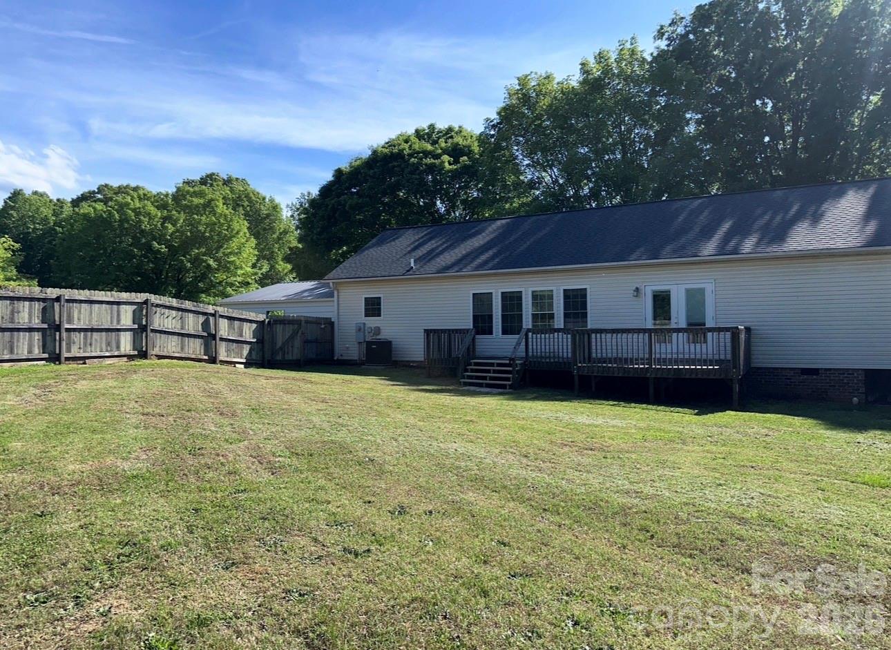 172 Jesse King Road Advance, NC 27006 - Photo 5 of 23 a view of a house with a backyard